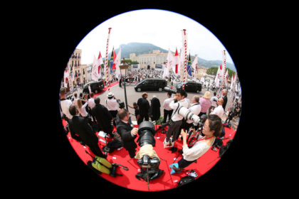 View through a fish eye lens of the press pack on a red carpet from above