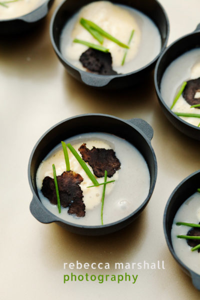 Several small taster dishes of miso soup with black truffle sabayon