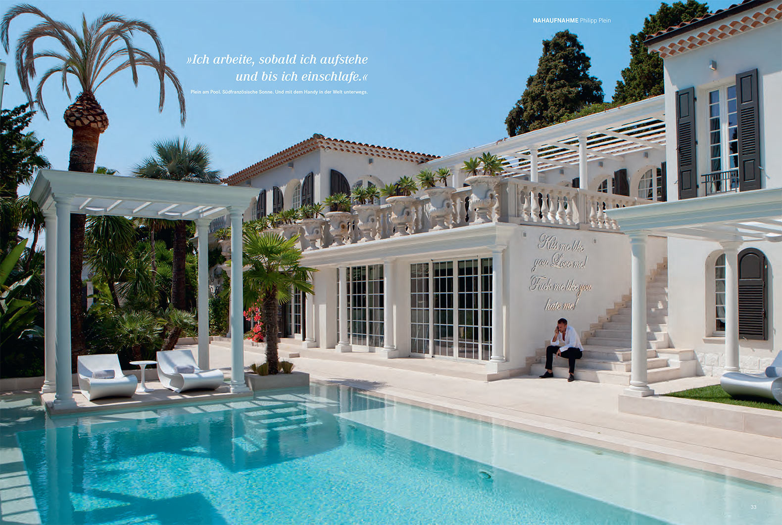 Tearsheet of page layout of Handelsblatt magazine showing double page photograph of fashion designer Philipp Plein on the terrace of his villa