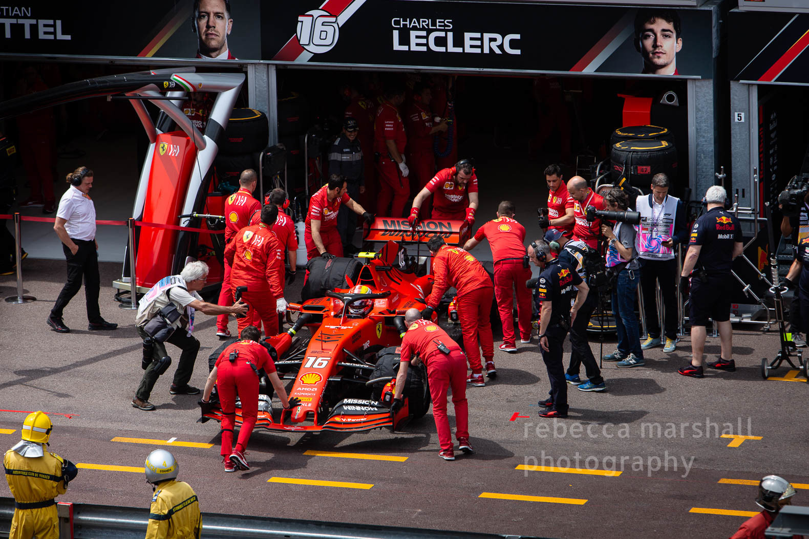 Photograph of race car being reversed into Ferrari garage during the Monaco Grand Prix