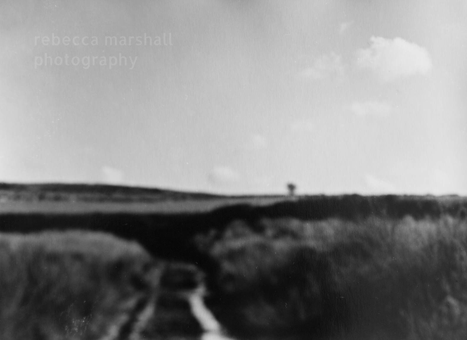 Out of focus black and white photograph of an empty landscape