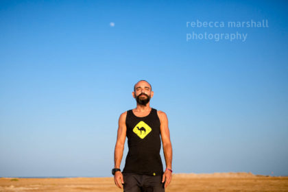 Portrait of man with eyes closed in the desert