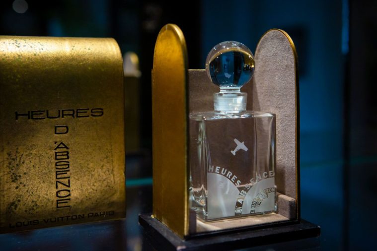 A vintage bottle of perfume in its golden case