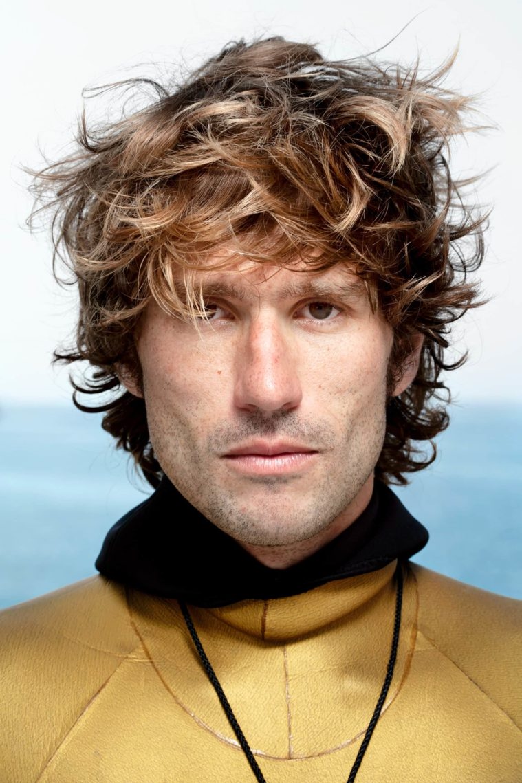 Close-up portrait of a man in a wetsuit