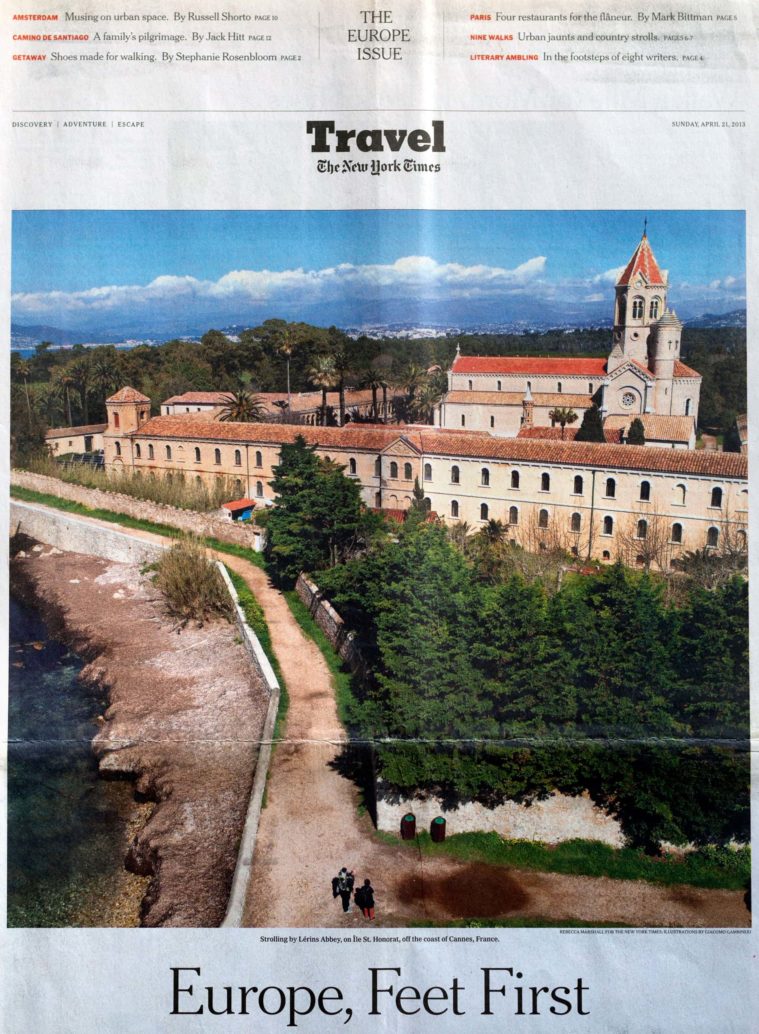 Newspaper suppliment cover showing an arial photograph of an abbey by the sea