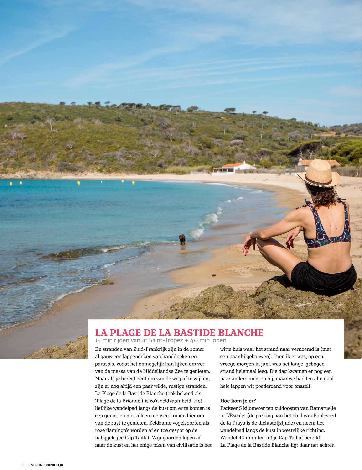 Single page magazine spread showing text and a photograph of a woman sitting on rocks above an empty beach