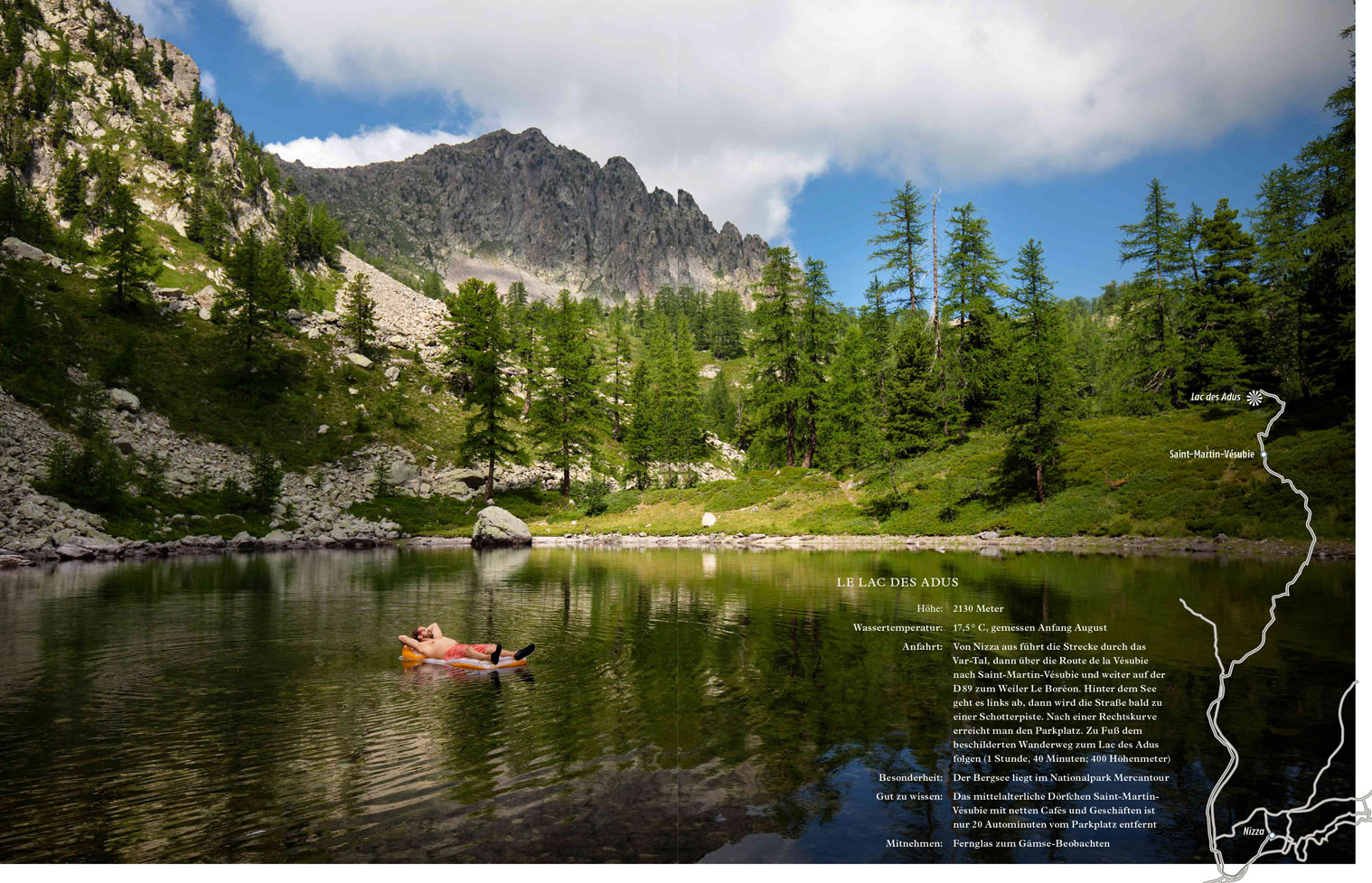Double page magazine spread showing a full bleed photograph of a man on a lilo in the middle of a mountain lake