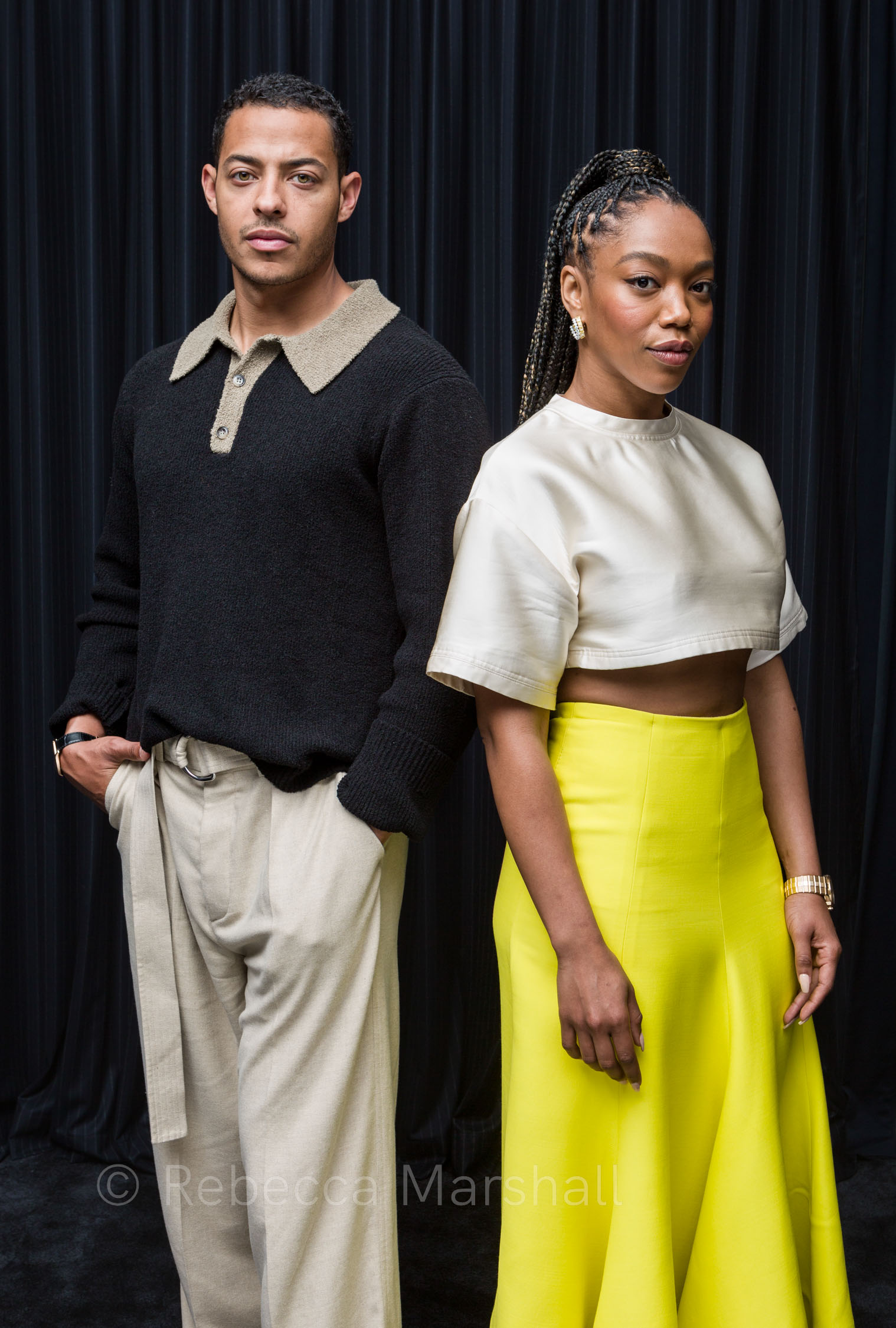 Double portrait of actors Daryl McCormack and Naomi Ackie in front of a black curtain