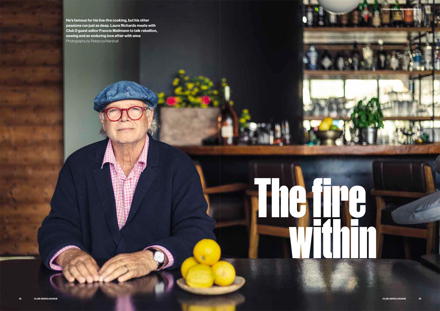 Double title page spread in Club Oenologique magazine, a full bleed portrait of chef Francis Mallmann, seated at a table