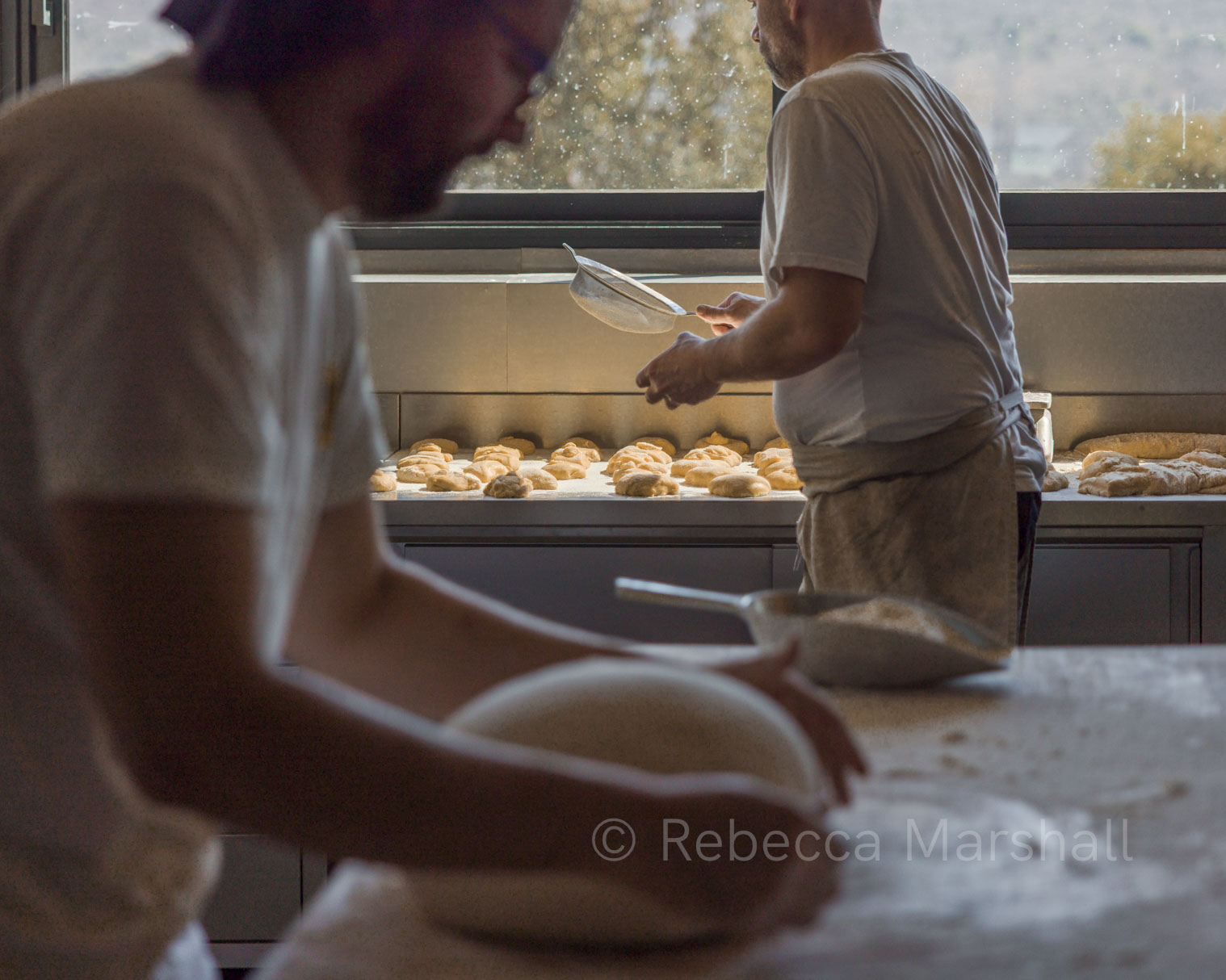 Bakery with a view Photograph of two bakers at work in their bakery