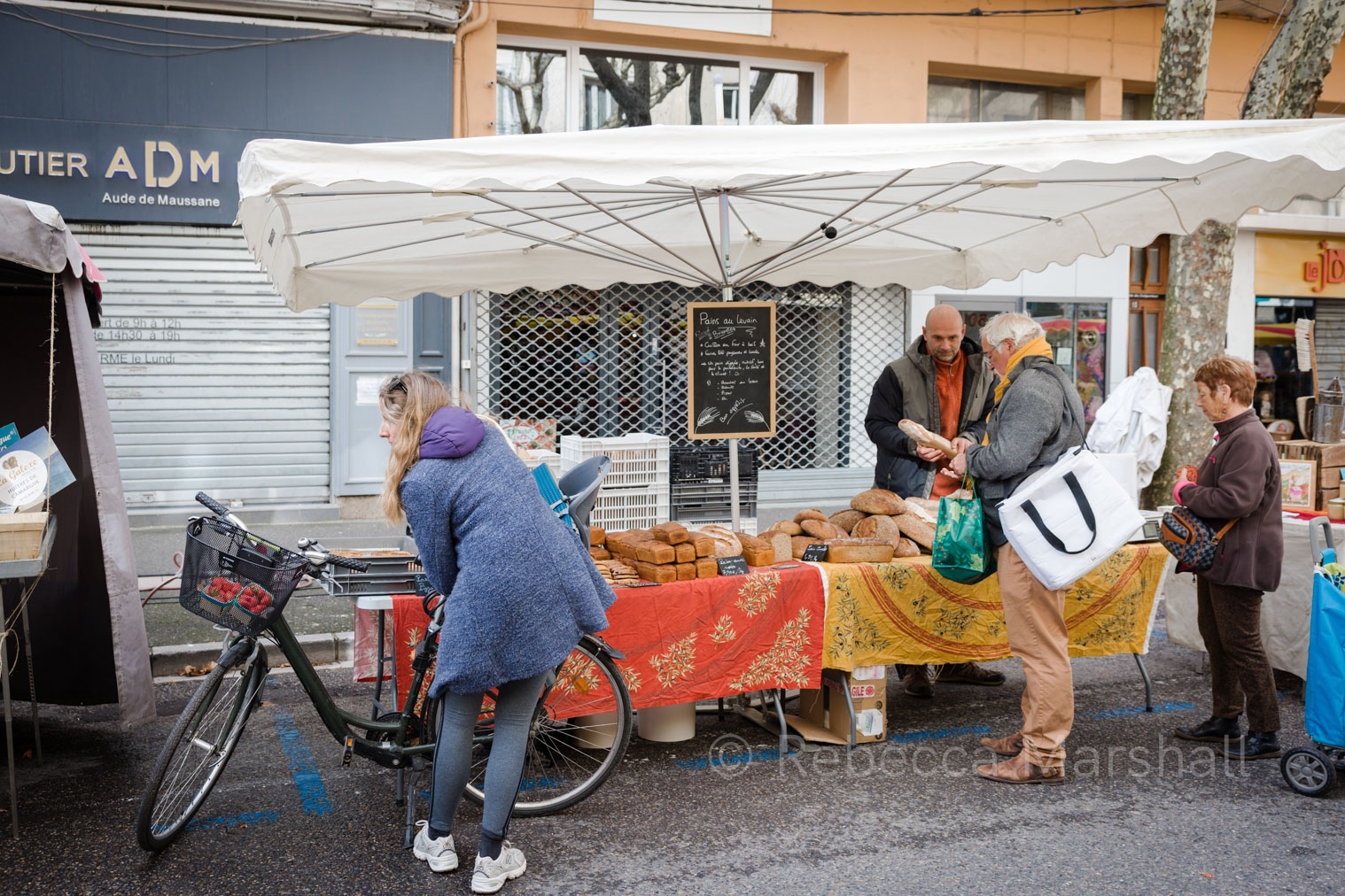 Bakery Market Stall Photograph of a busy bakery market stall in Provence